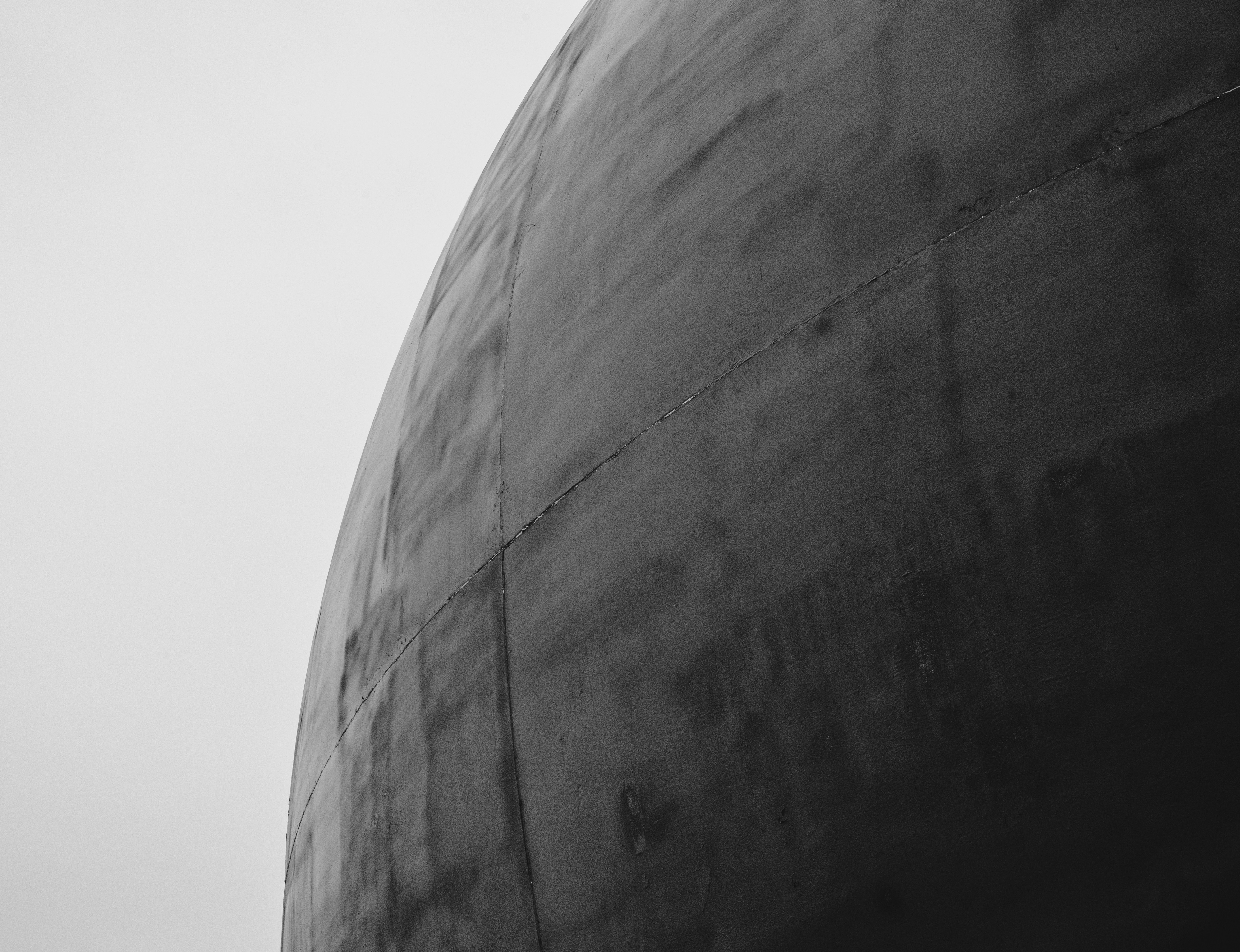 a black and white photo of the side of a building