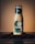 A bottle of Starbucks Frappuccino chilled coffee drink is placed on a surface surrounded by coffee beans. The background is a gradient of warm brown tones, creating a cozy and inviting atmosphere. The bottle is tall and slender with a green and white Starbucks logo prominently displayed.
