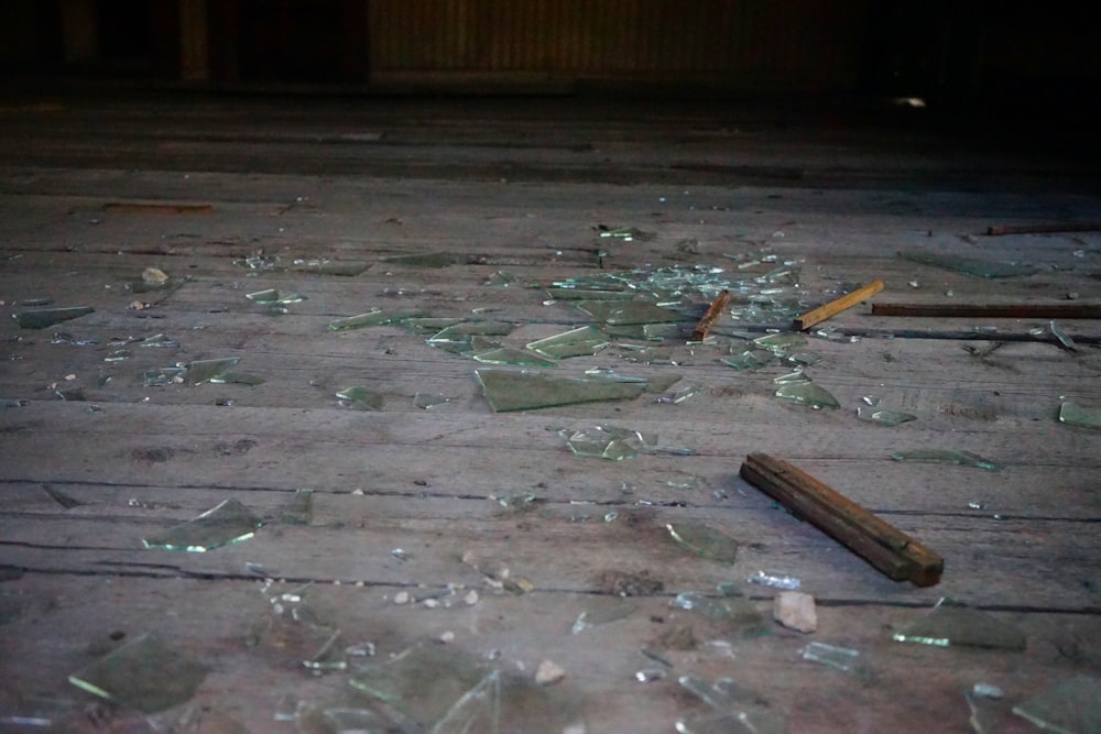 broken glass on the floor of a building