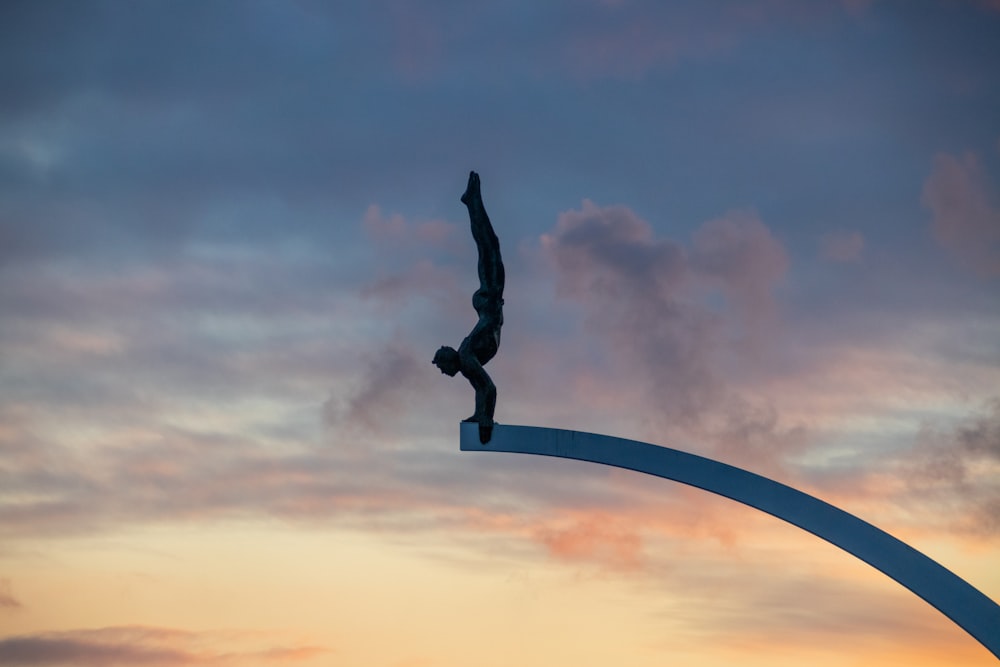 a person on a surfboard doing a trick in the air