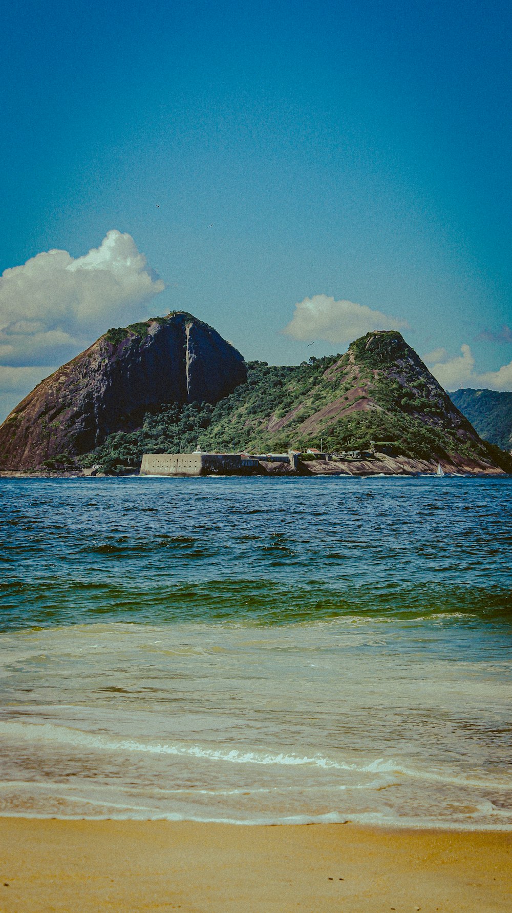 a small island in the middle of a body of water