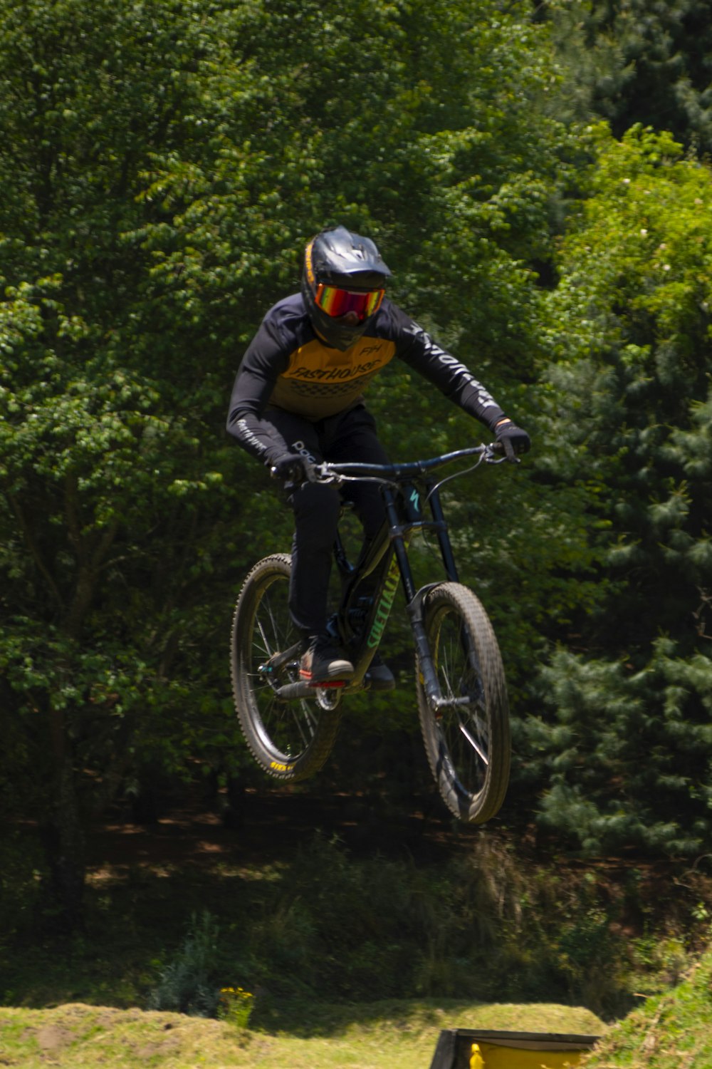 a person jumping a bike in the air