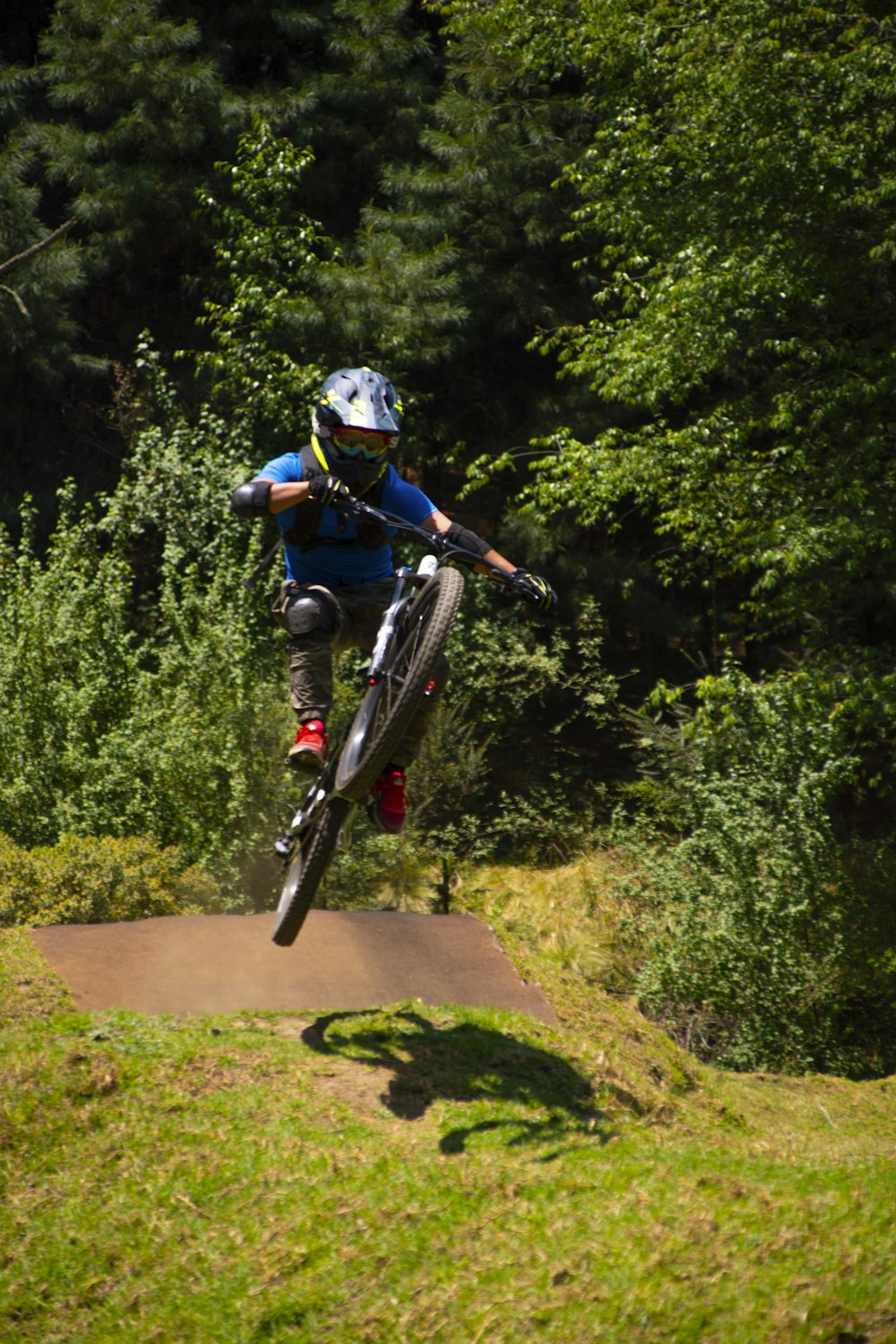 a person jumping a bike in the air