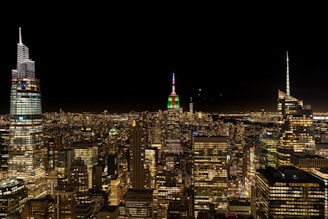 A vibrant city skyline at night, illuminated with deep reds and burgundy tones reflecting strength and leadership.