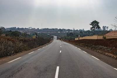 a long empty road with no cars on it