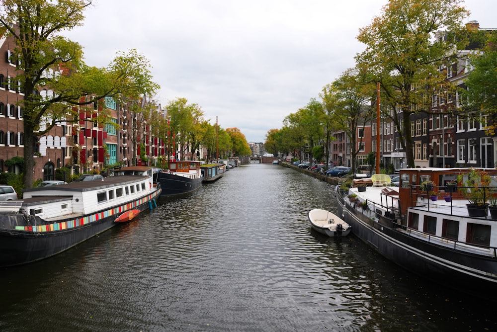 a canal with several boats in the water