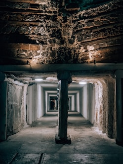 a dark tunnel with a light at the end