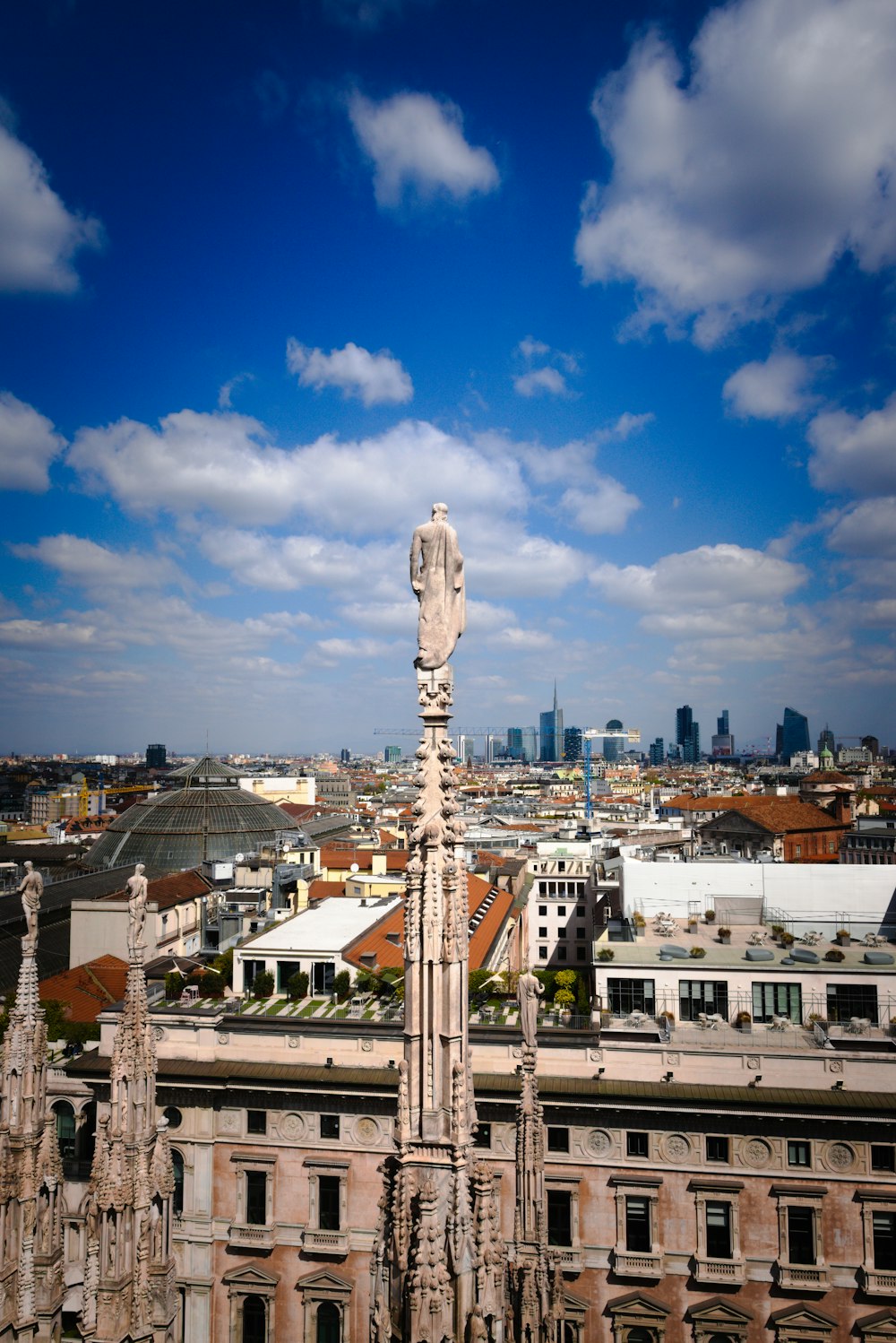 a tall clock tower towering over a city