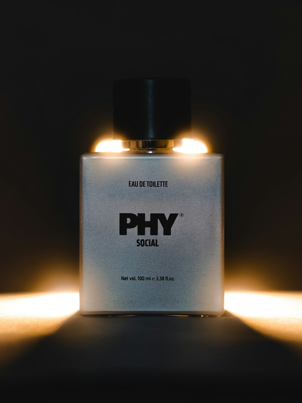 a bottle of phy social on a table