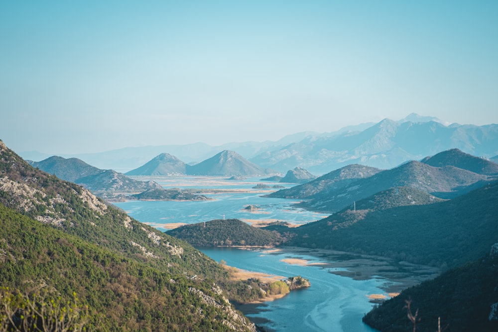 a view of a river running through a valley