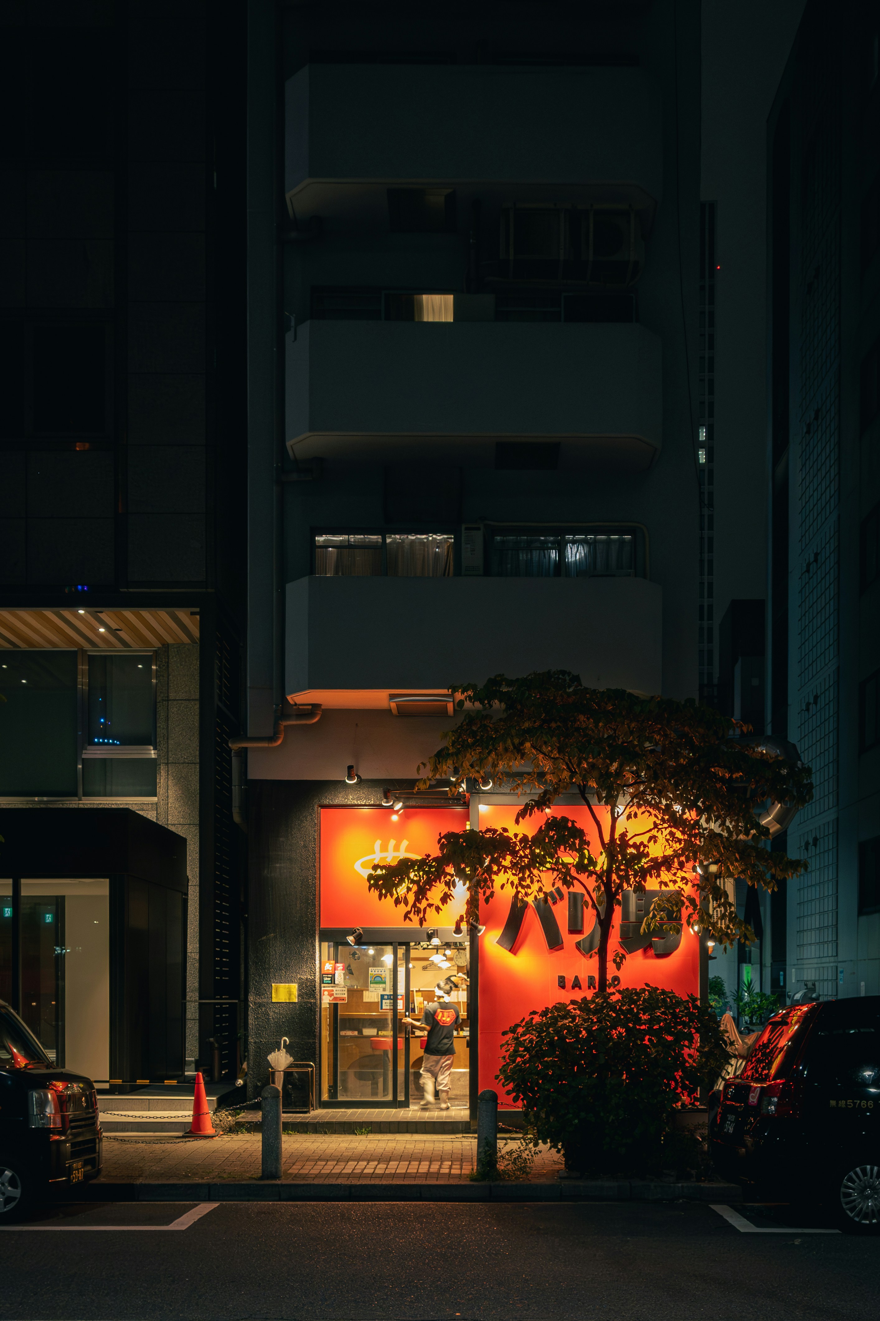 Modern Neo-Yokocho alley at nighttime with people and lights