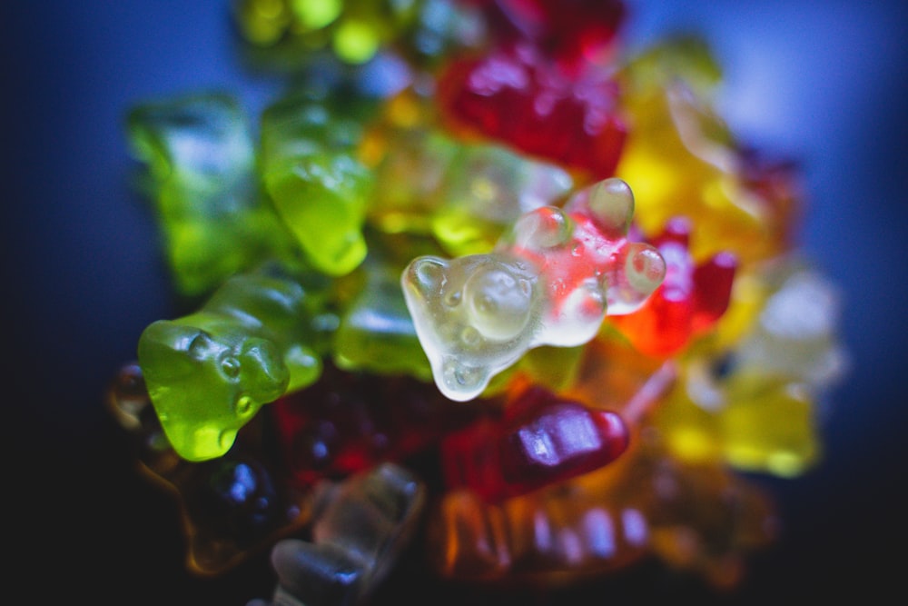 a bunch of gummy bears sitting on top of each other