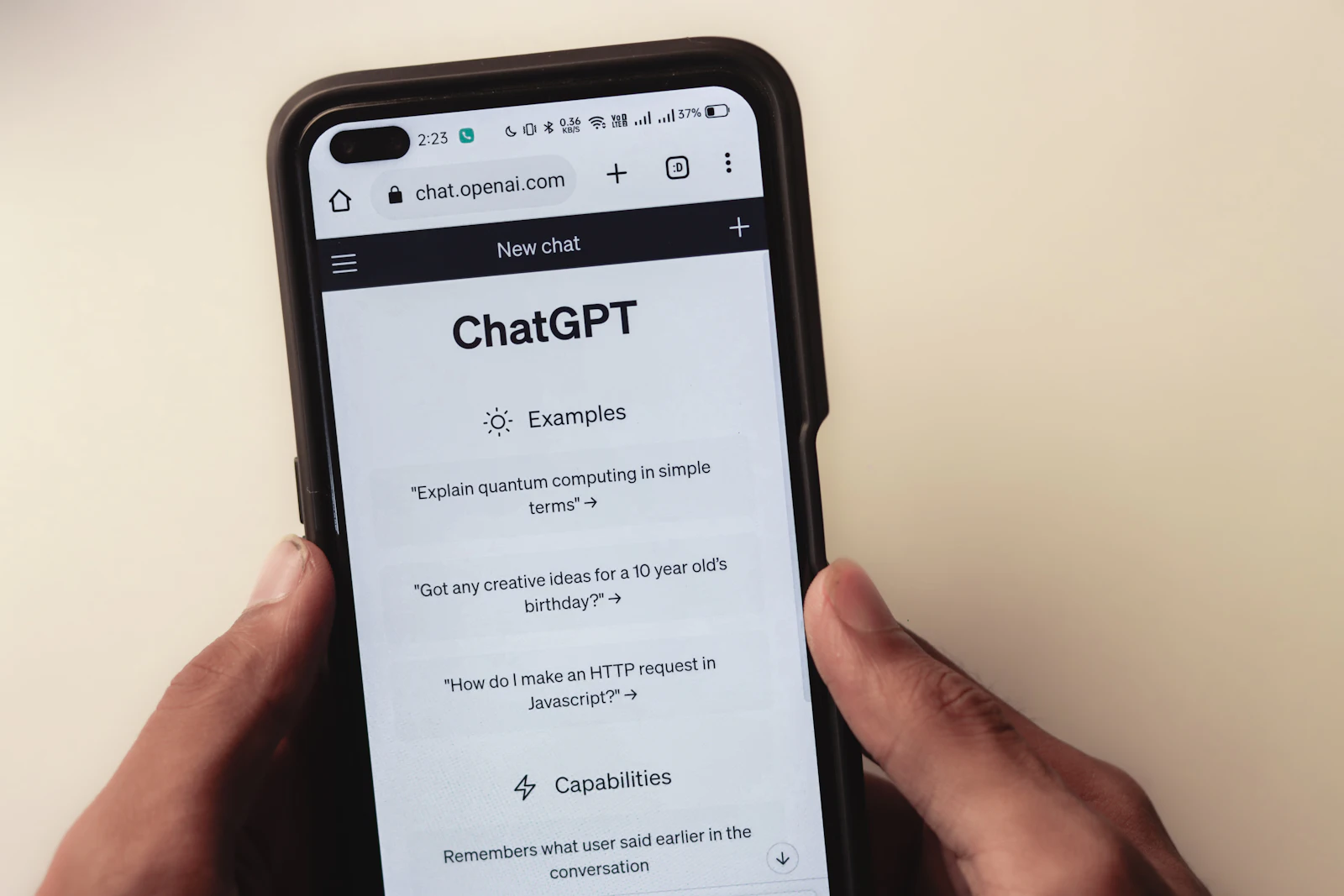 A phone with a chat app on the screen