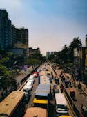 A bustling Karachi street scene during rush hour with vibrant city life.