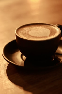 Rotating animation of the coffee of the day in a warm, inviting setting.