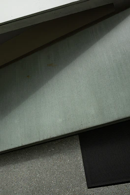 Close-up of textured concrete steps with a bold brown finish and sharp lines.