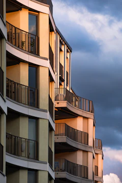 Elegant Godrej apartment complex with sunset backdrop.