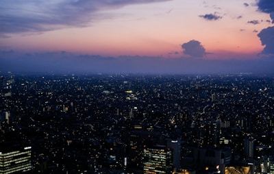 An expansive city skyline at dusk symbolizing vast potential and upward momentum.