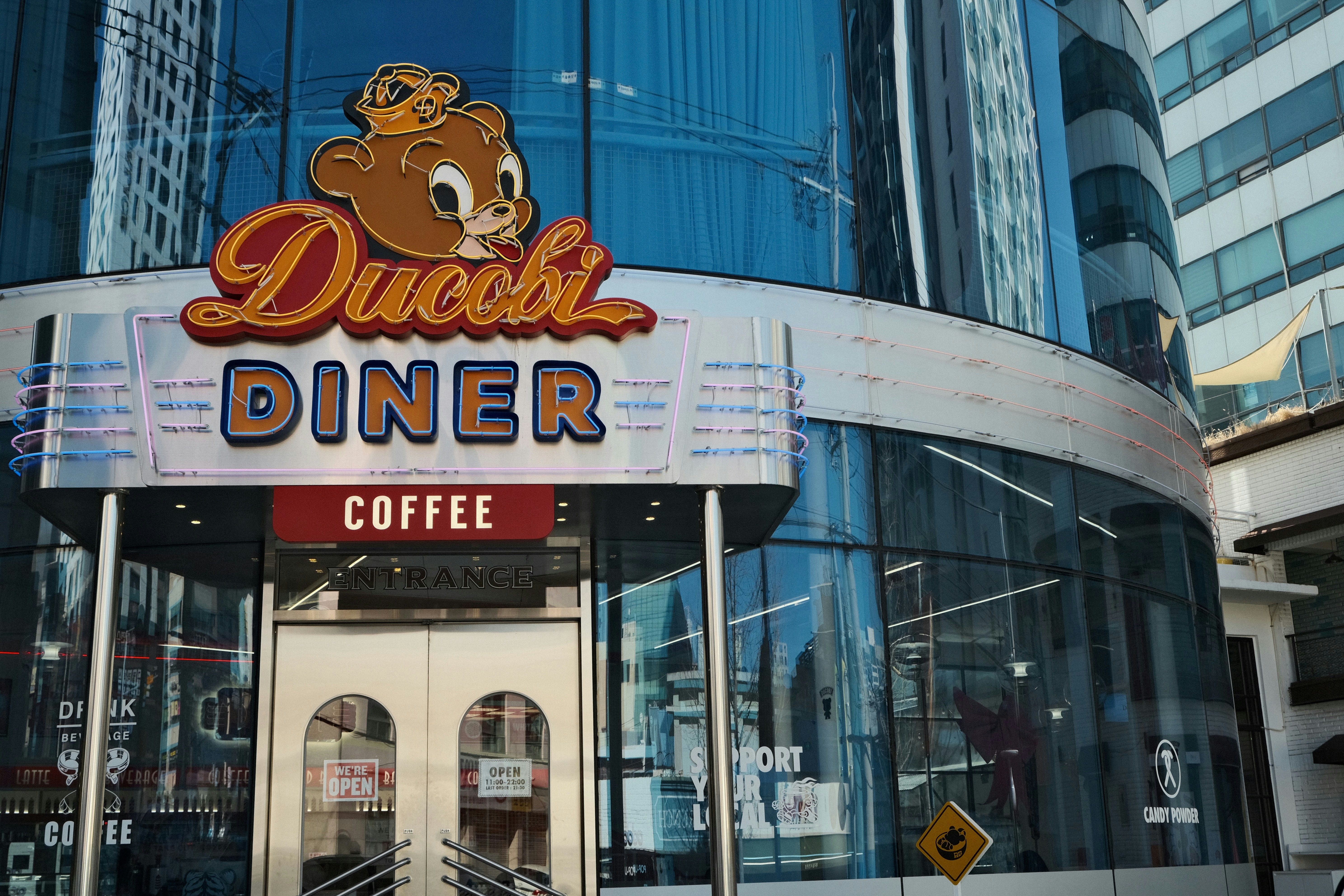 a building with a sign for a restaurant