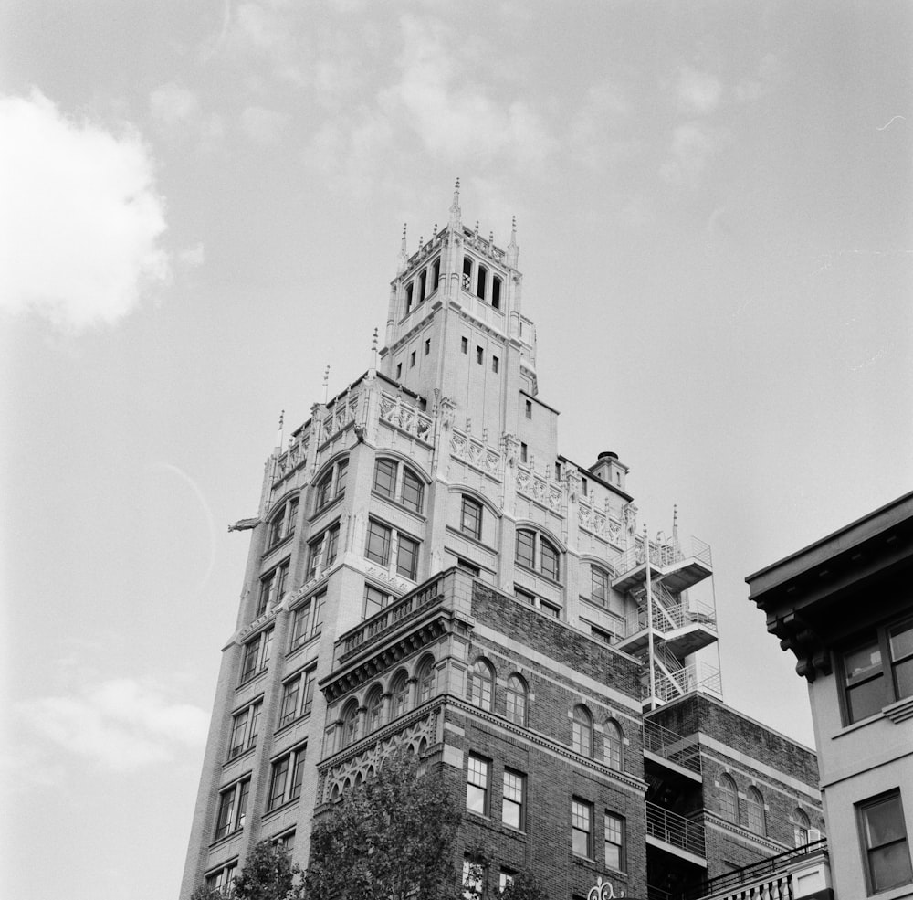 a tall building with a clock on the top of it