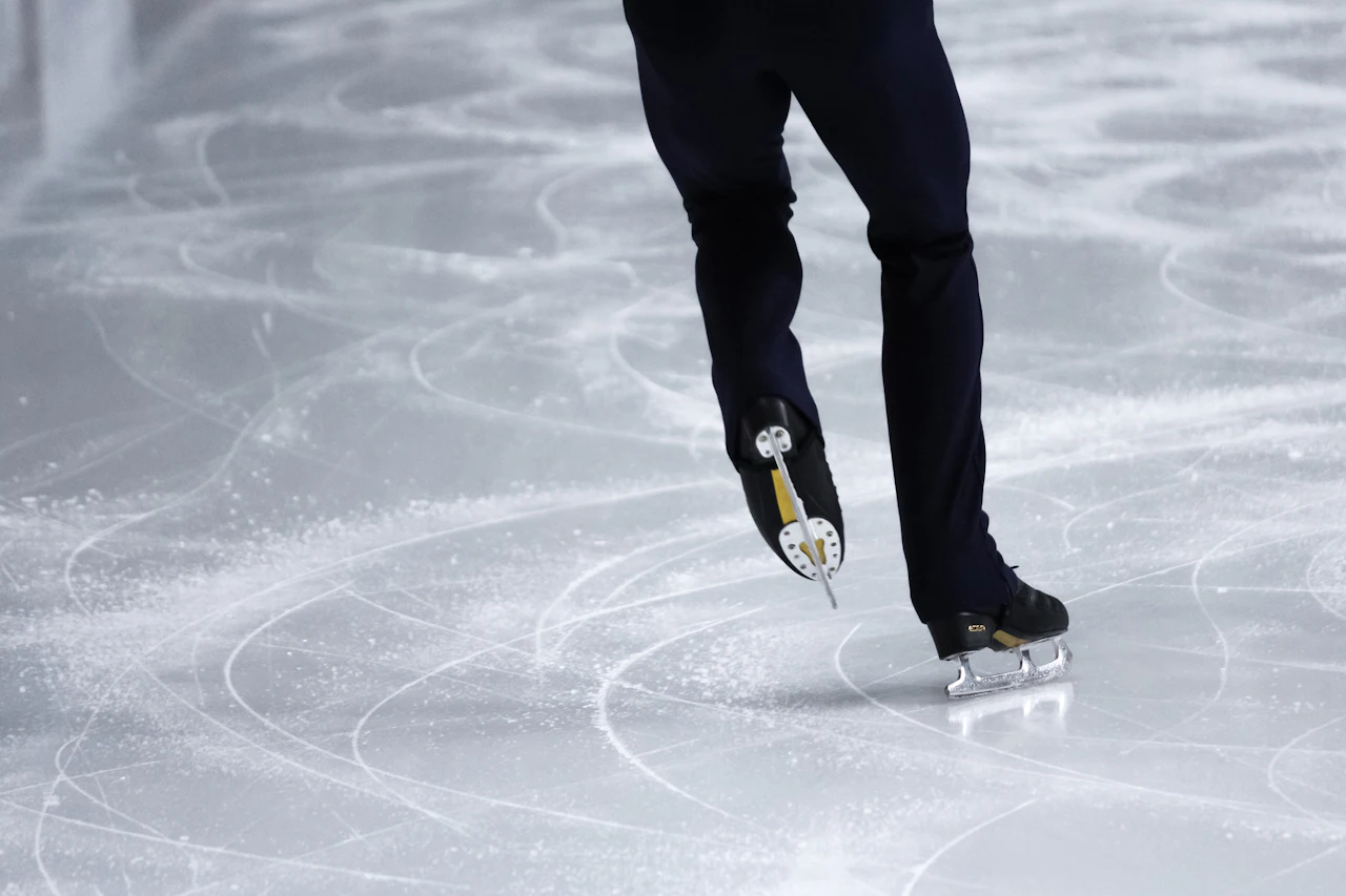 A skater on an ice rink during practice