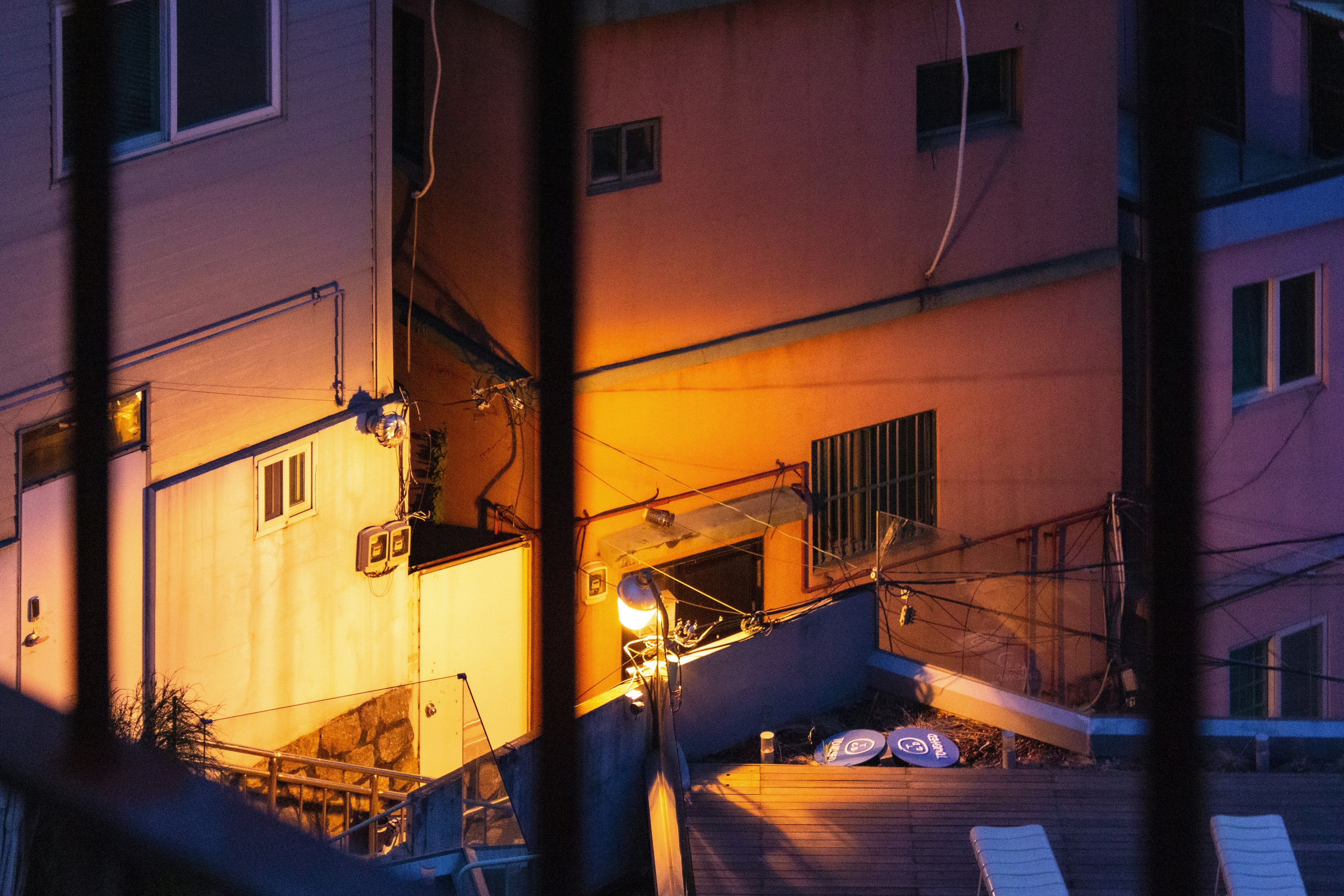 woman wearing yellow long-sleeved dress under white clouds and blue sky during daytime
