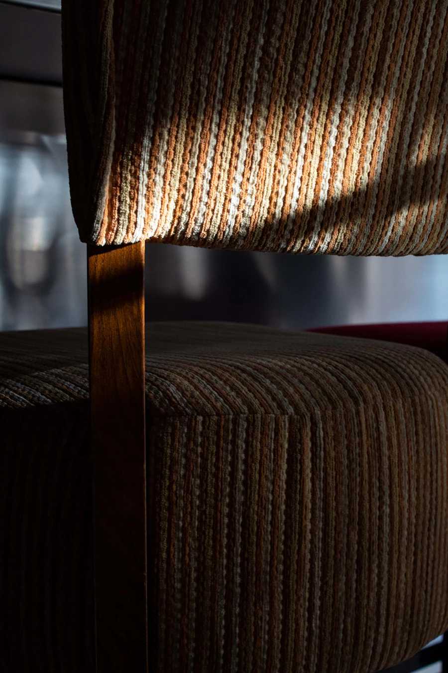 A close view of a chair with a timber frame