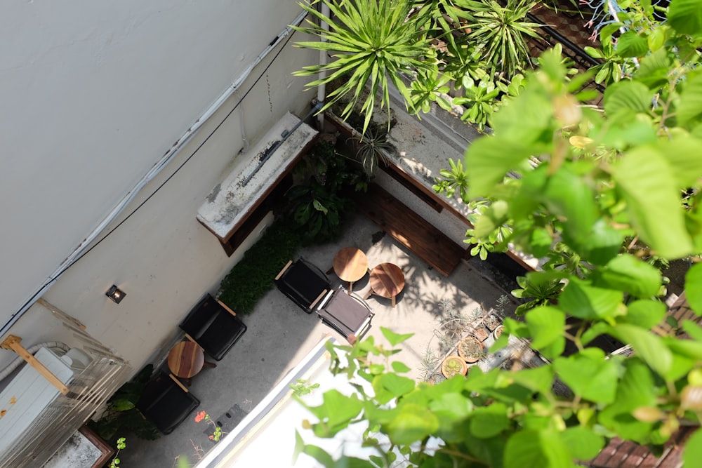 an overhead view of a patio with a table and chairs