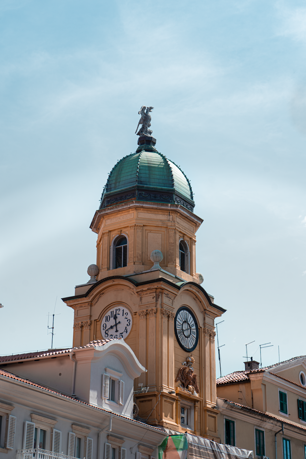 a large building with a clock on the top of it