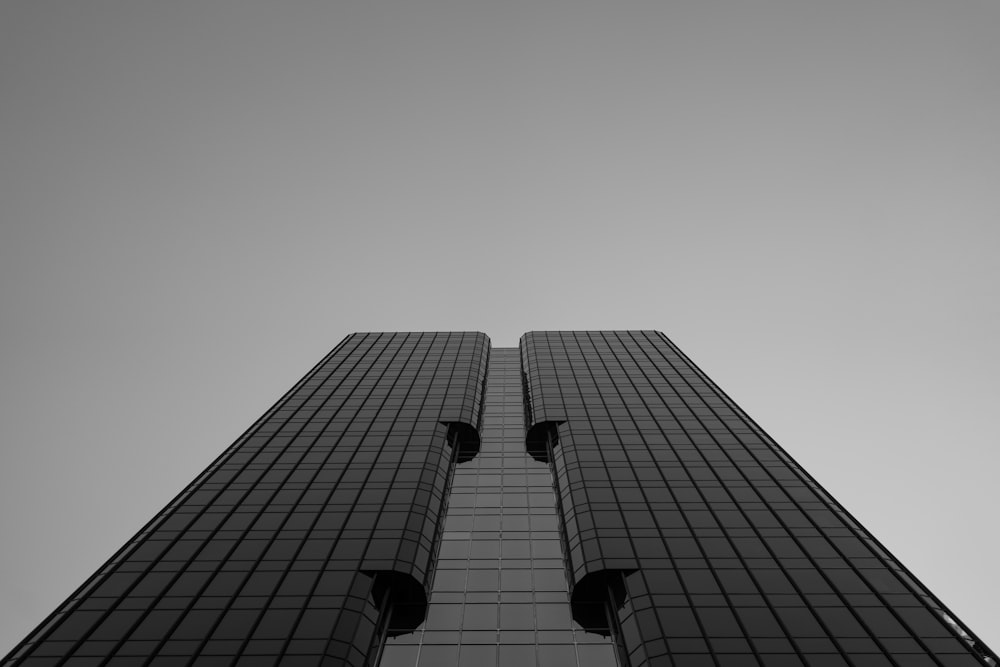 looking up at the top of a tall building