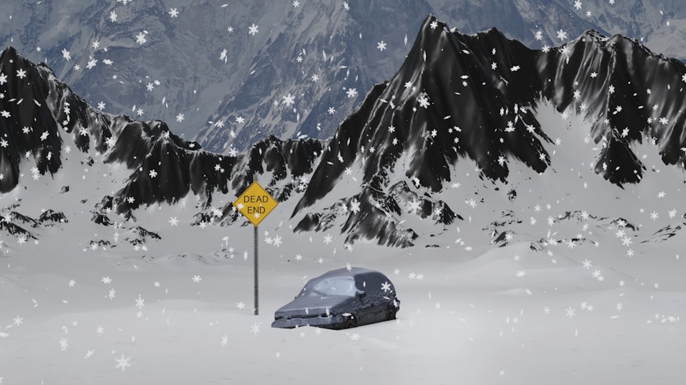 a car parked in the snow next to a snow covered mountain