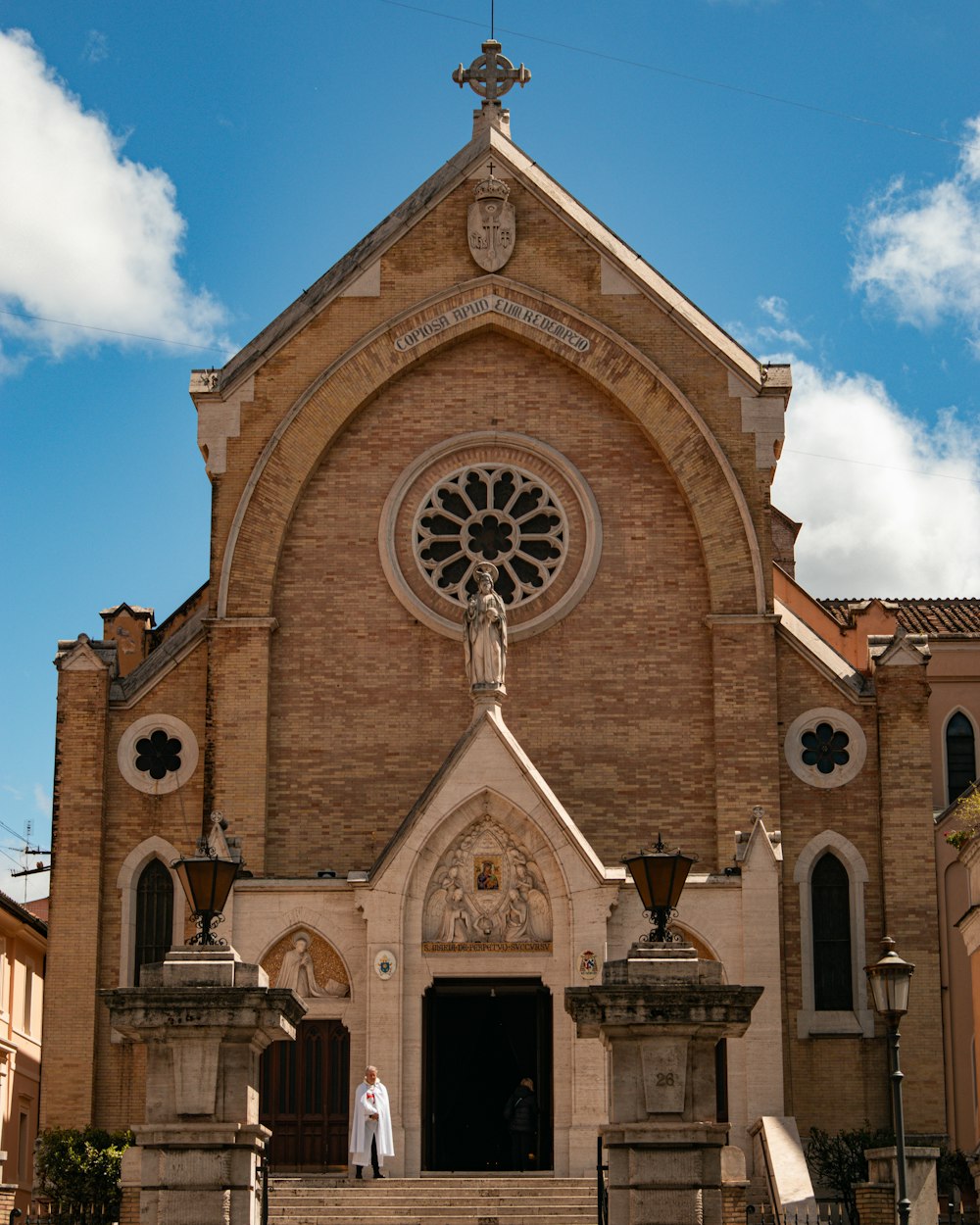 a large church with a clock on the front of it