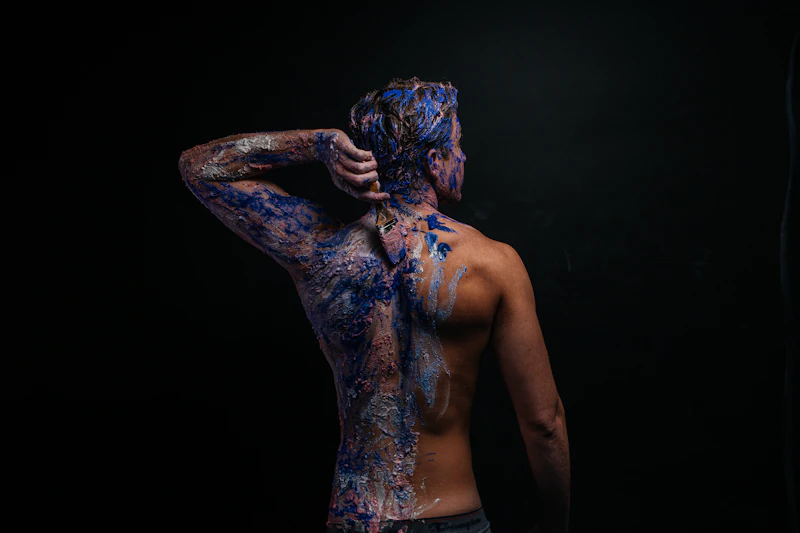 artistic Pride portrait with blue paint