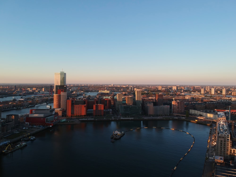 a large body of water surrounded by tall buildings