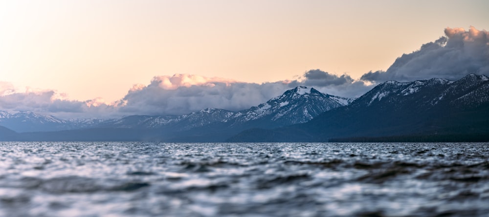 a view of a mountain range from a body of water