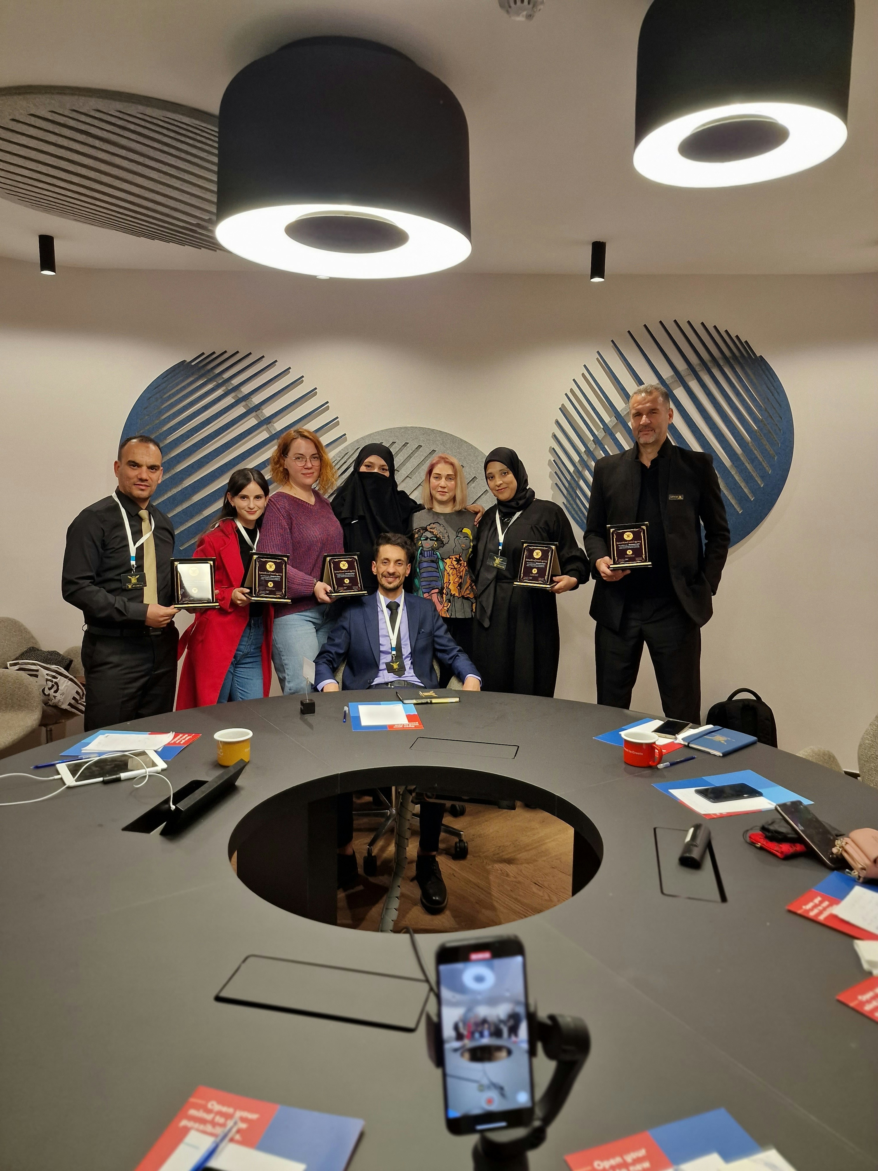 Regional conference with diverse professionals networking in modern venue