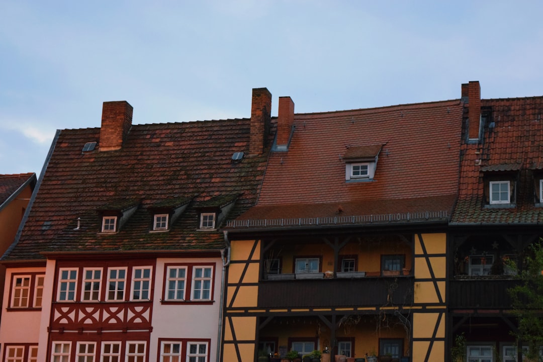 a couple of buildings that are next to each other, Erfurt pitched roofs