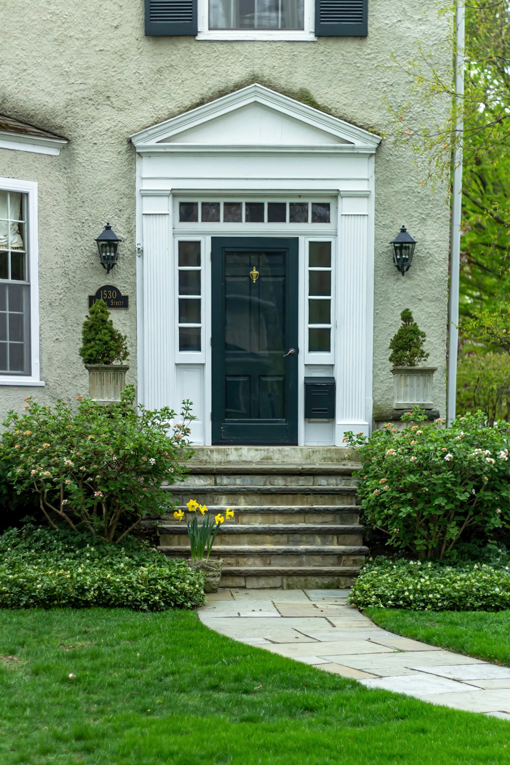 a house with steps leading to the front door