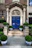 Elegant law office entrance with subtle gold and navy blue details.