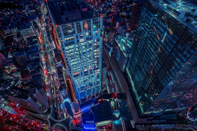 An aerial view of a vibrant city skyline with busy streets.