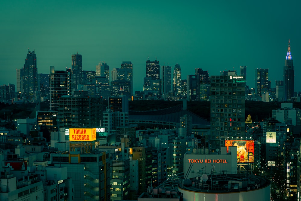 a view of a city at night from the top of a building