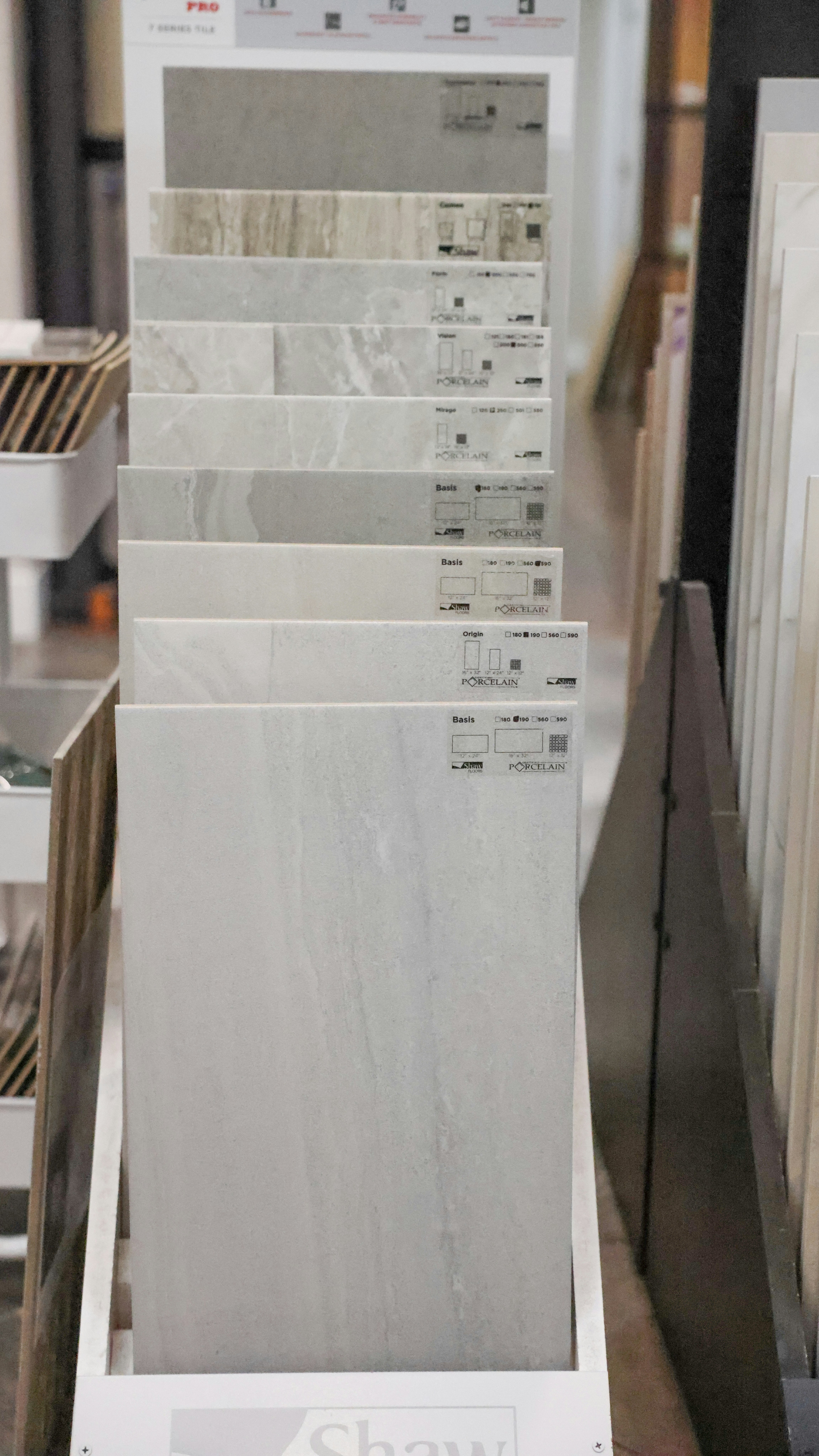 Ceramic and porcelain floor tiles arranged in a showroom display