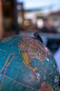 a close up of a globe on a table