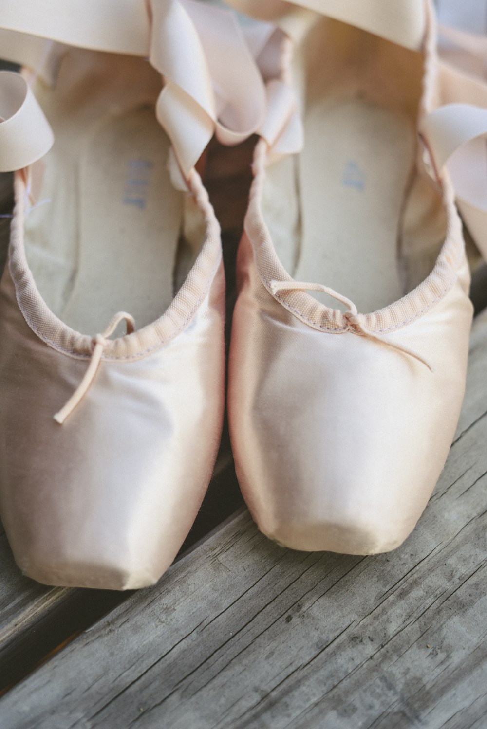 a close up of a pair of ballet shoes