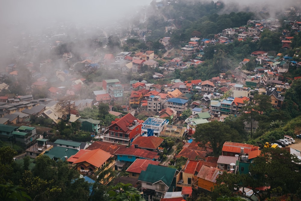 a city with a lot of houses on a hill