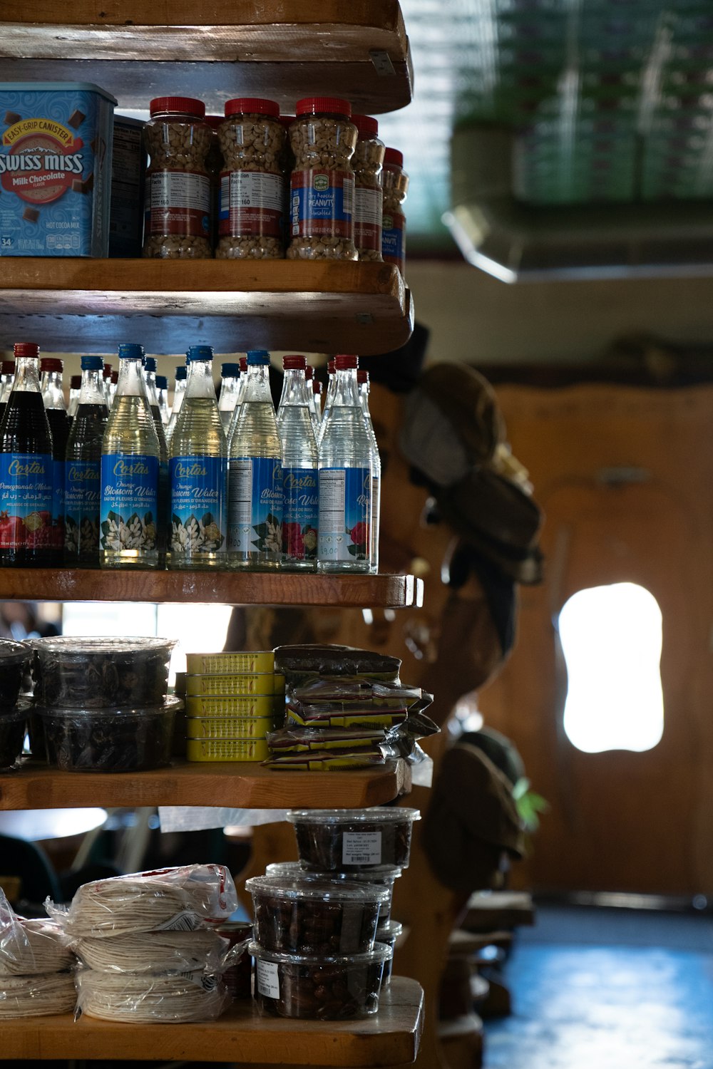 a shelf filled with lots of different types of food