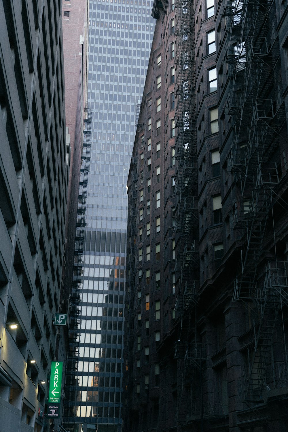 a city street filled with tall buildings next to each other