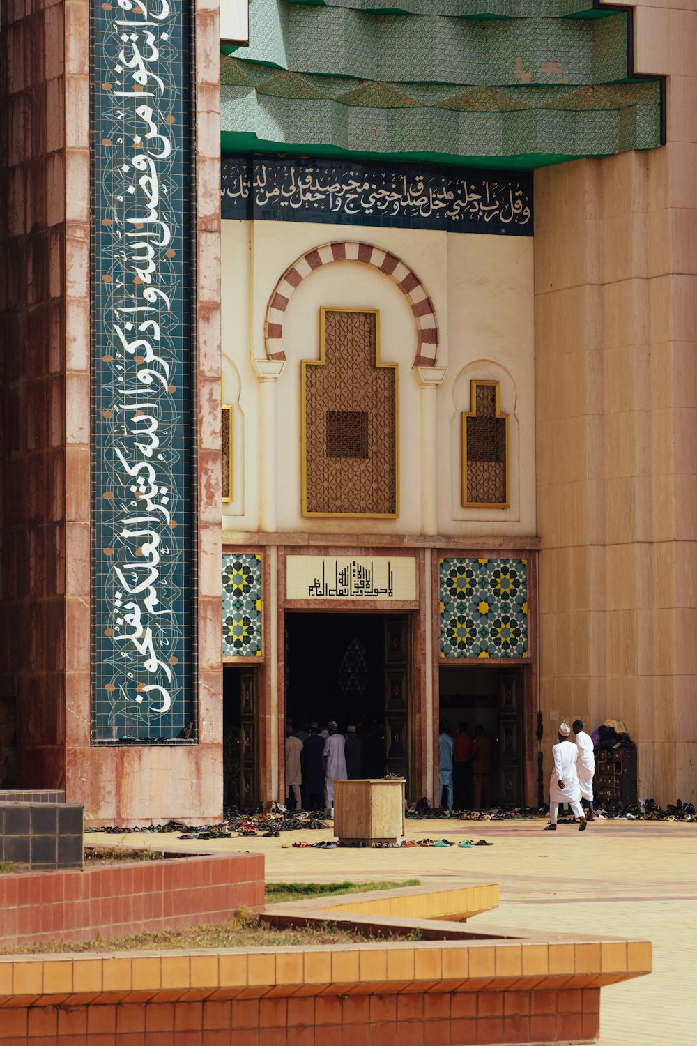 a group of people standing in front of a building