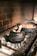 A warm, rustic kitchen scene with a cast iron skillet cooking a hearty meal.