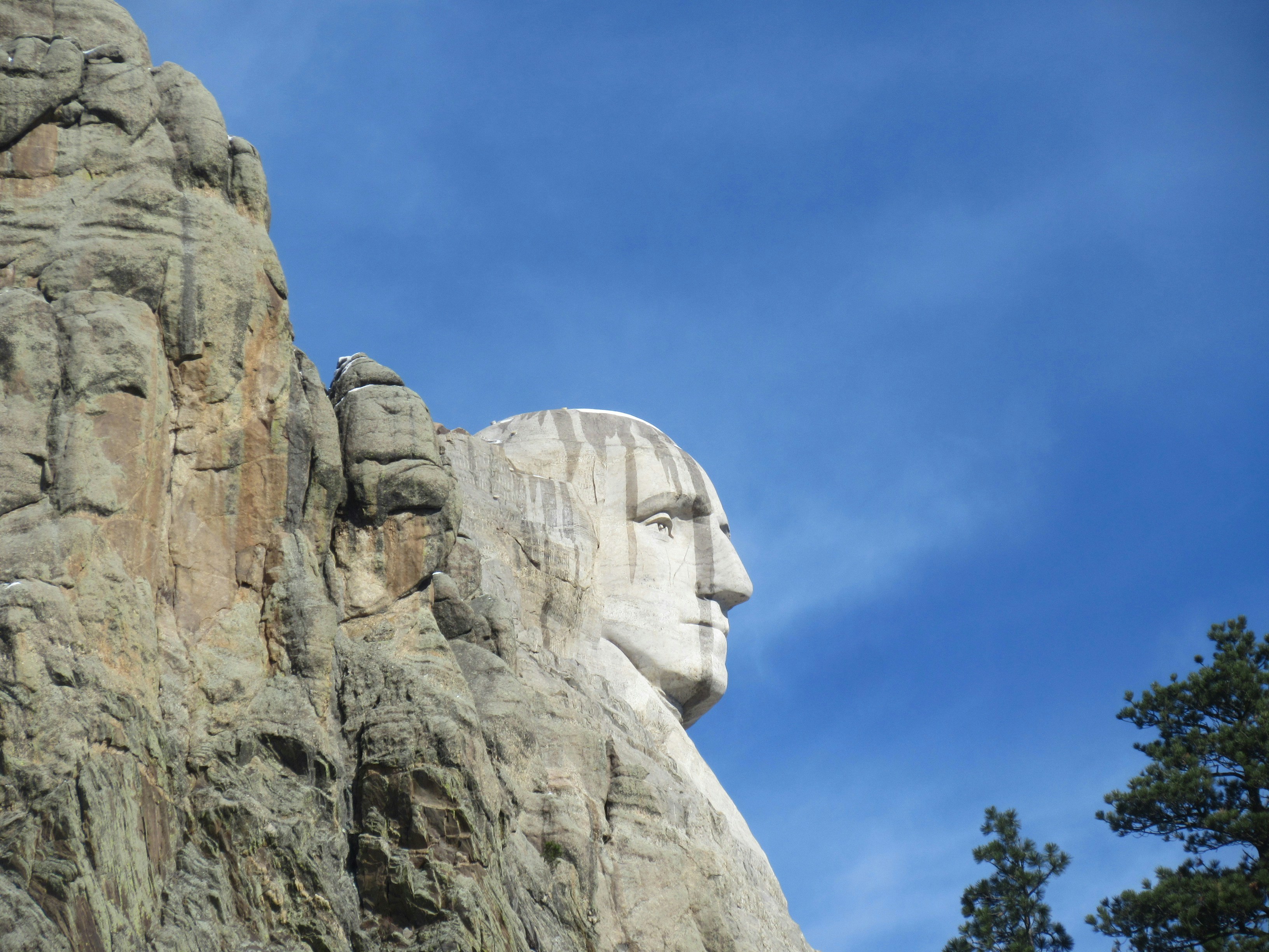 a close up of the face of a statue of abraham